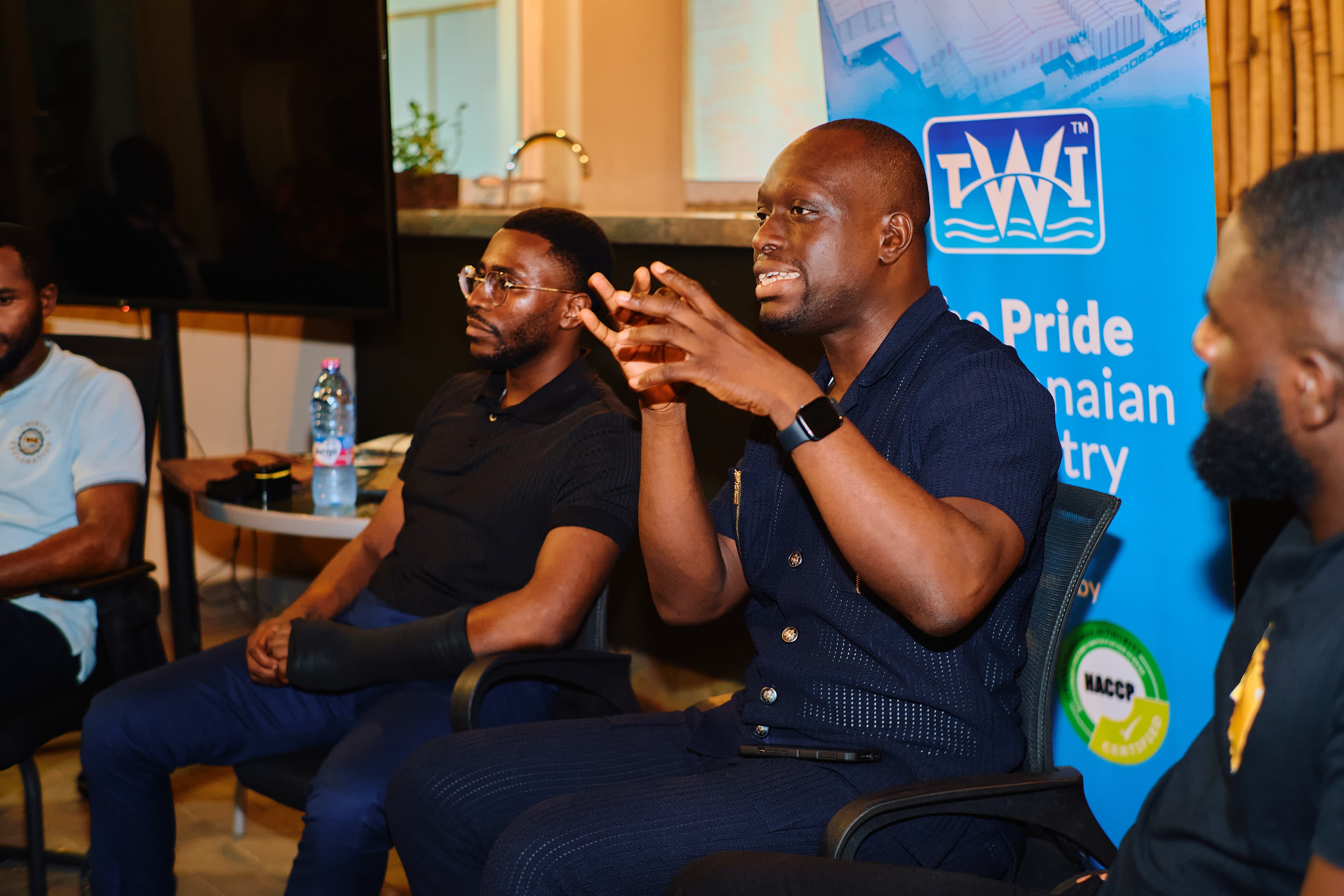 Two panellists in conversation during a fireside discussion.